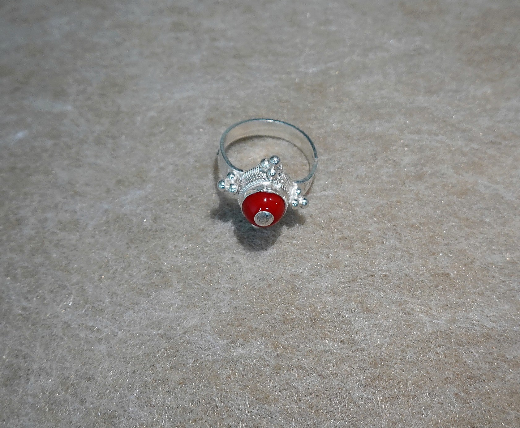 Handmade S999 silver Ember Star ring showing sculptural silver details