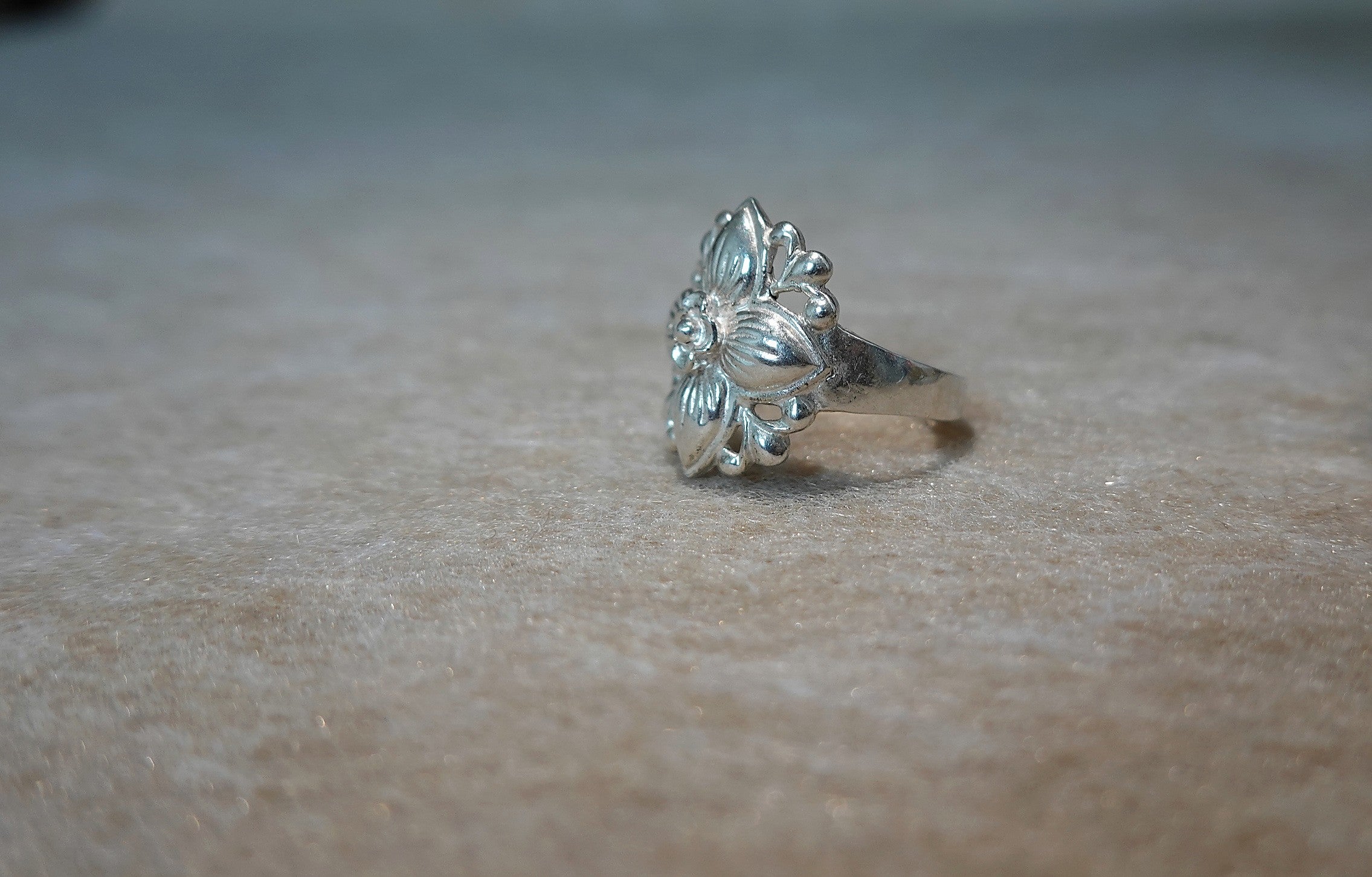 Handmade S999 silver Leaf in Bloom ring showing sculptural silver details