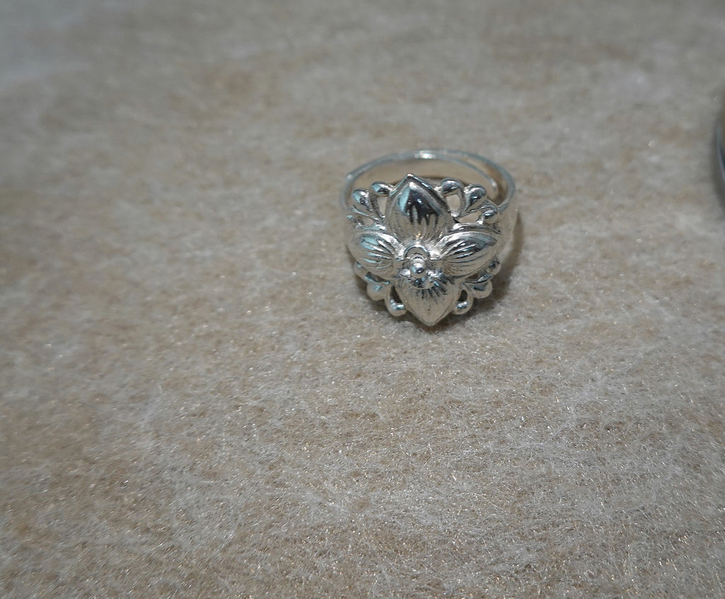 Handmade S999 silver Leaf in Bloom ring showing sculptural silver details