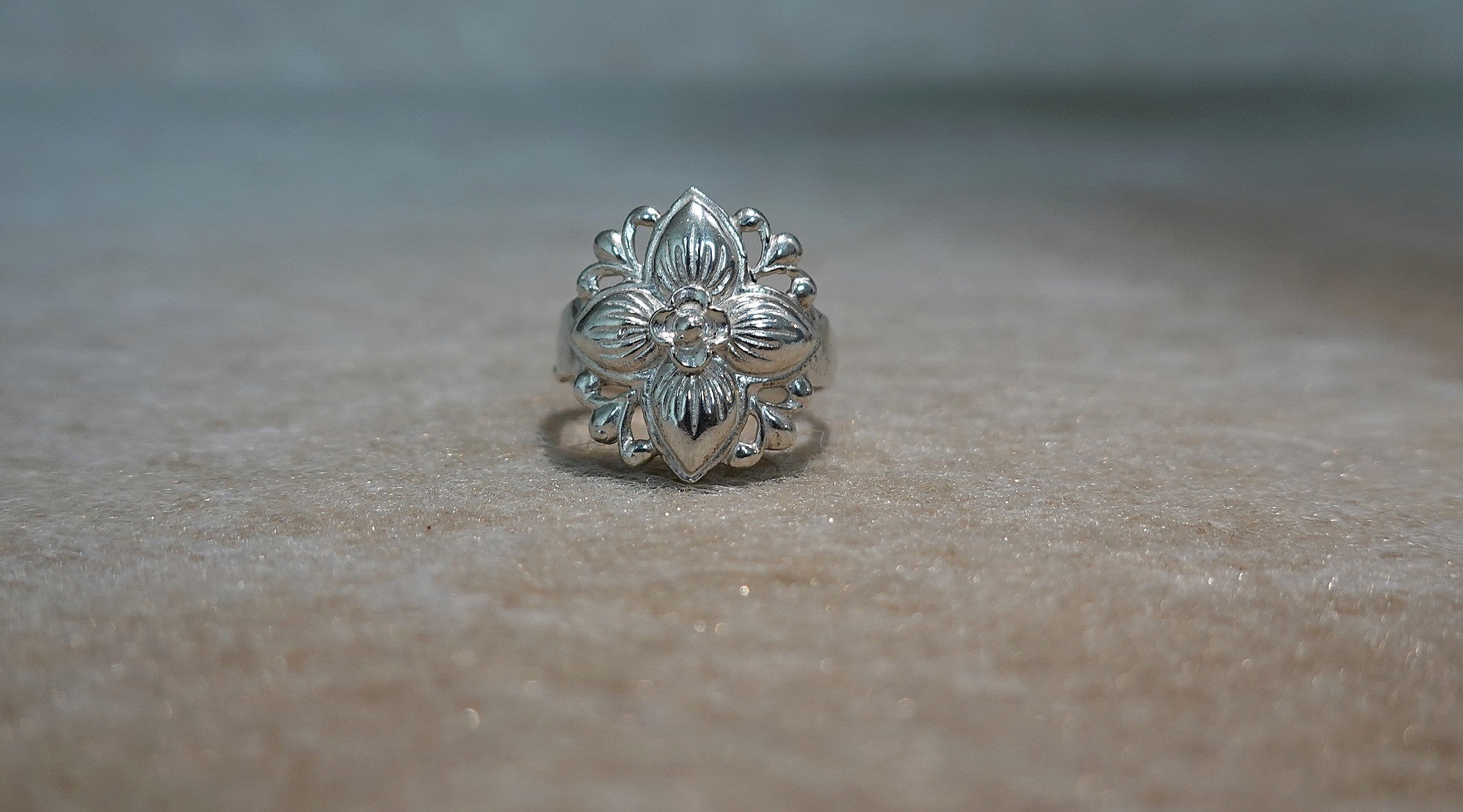 Handmade S999 silver Leaf in Bloom ring showing sculptural silver details