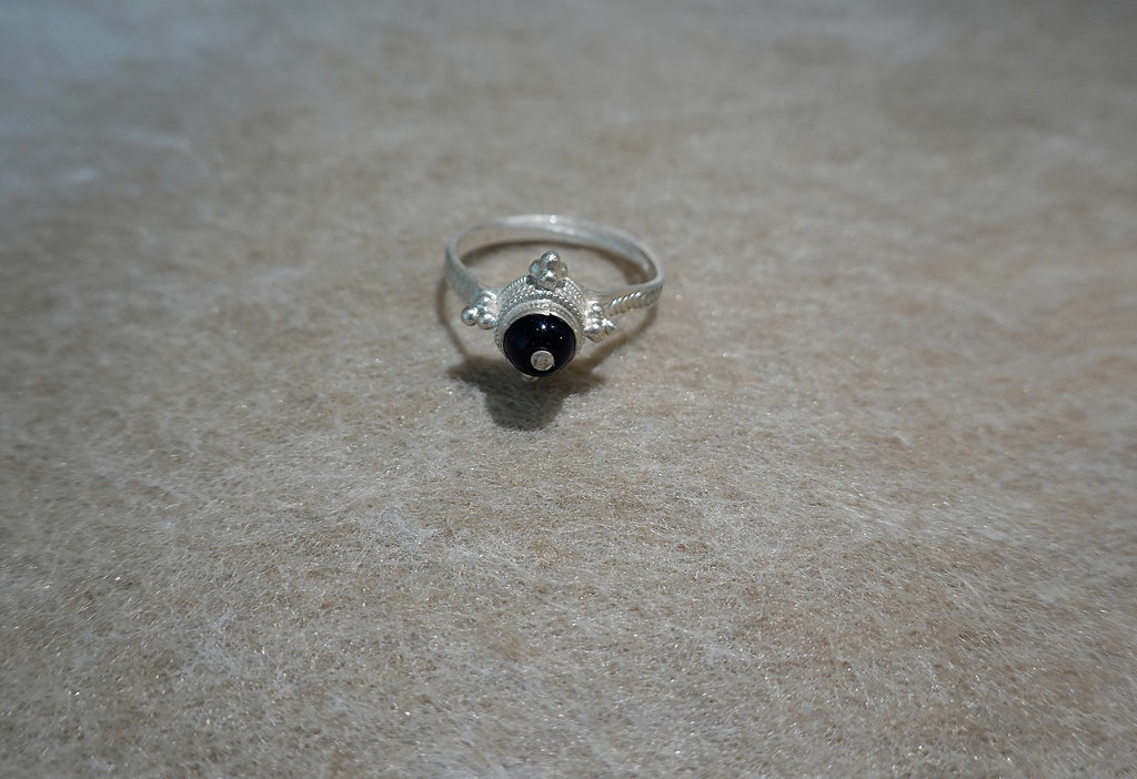 Handmade S999 silver Midnight Star ring showing sculptural silver details
