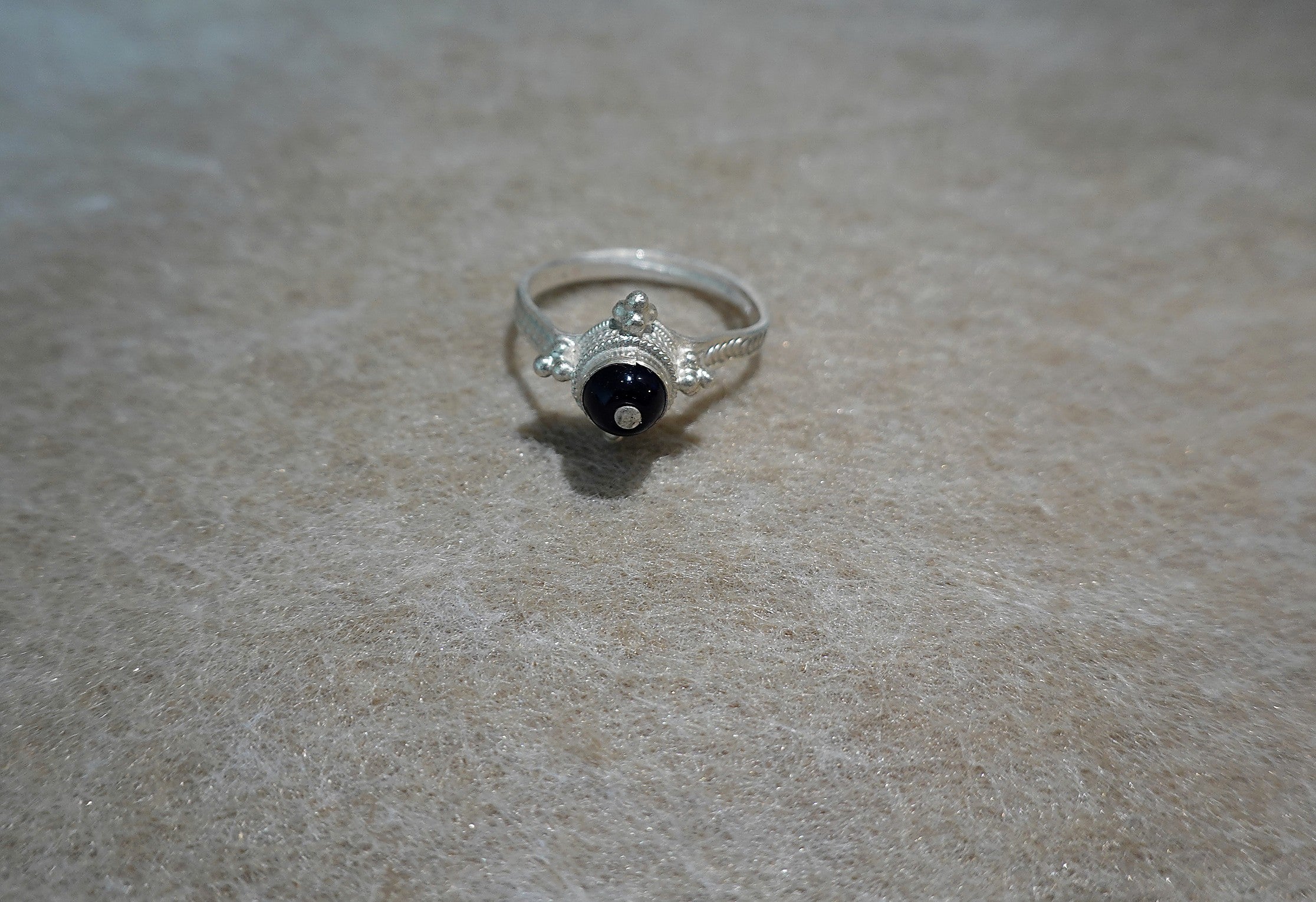 Handmade S999 silver Midnight Star ring showing sculptural silver details