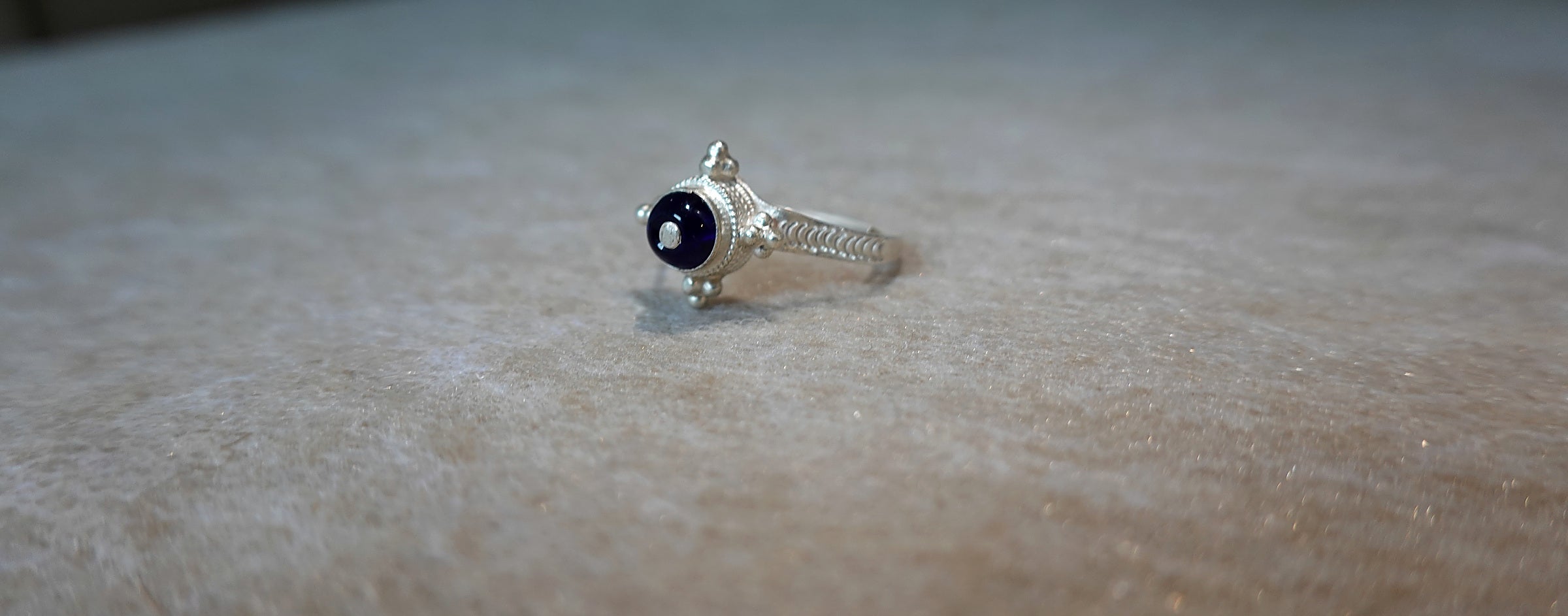 Handmade S999 silver Midnight Star ring showing sculptural silver details