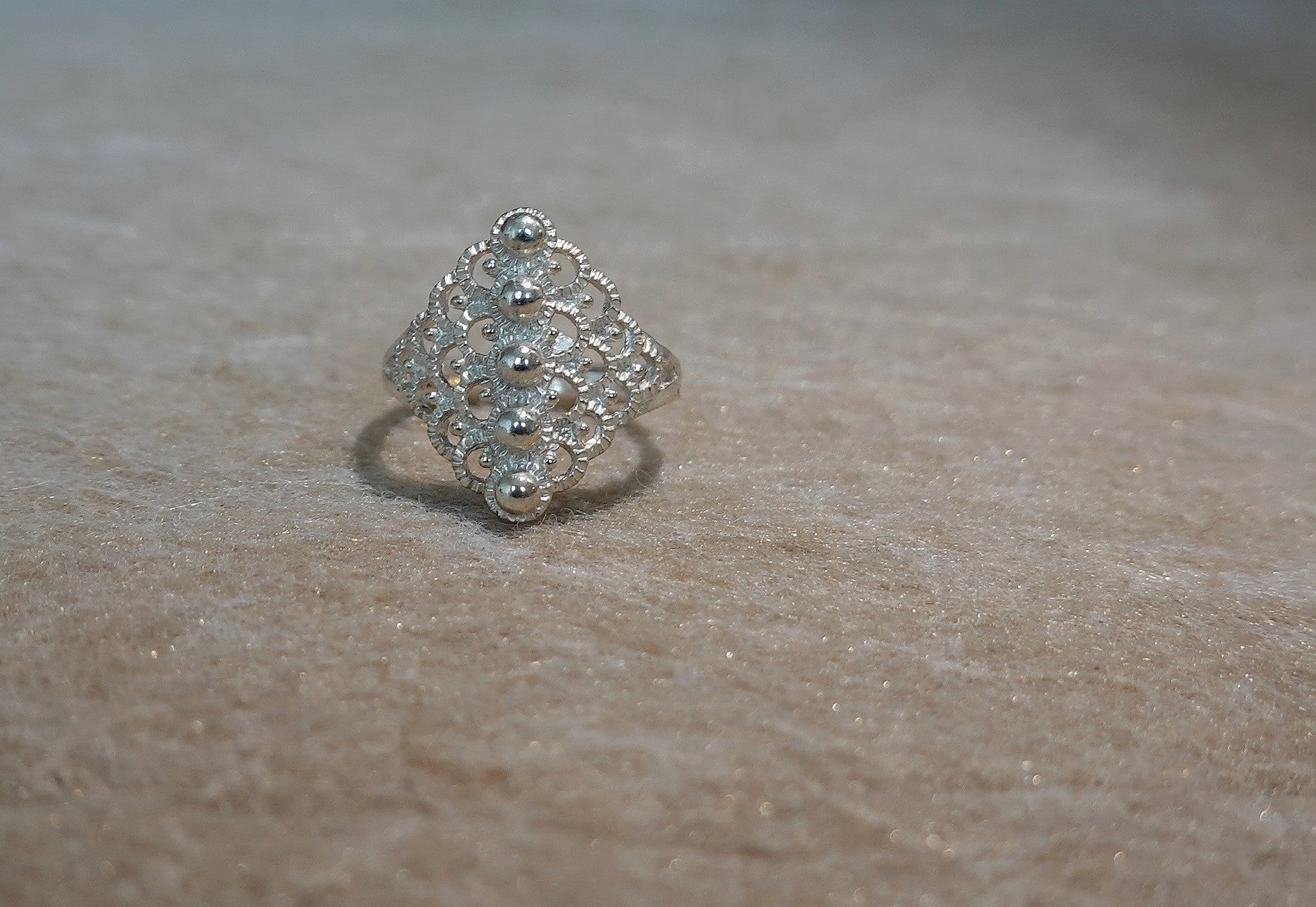 Handmade S999 silver Mountain Spring ring showing sculptural silver details