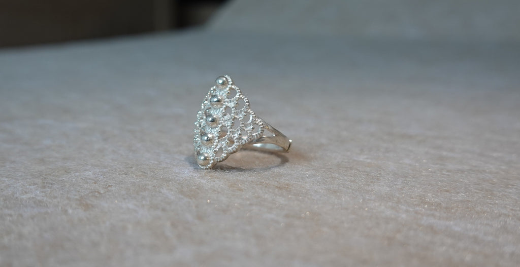 Handmade S999 silver Mountain Spring ring showing sculptural silver details