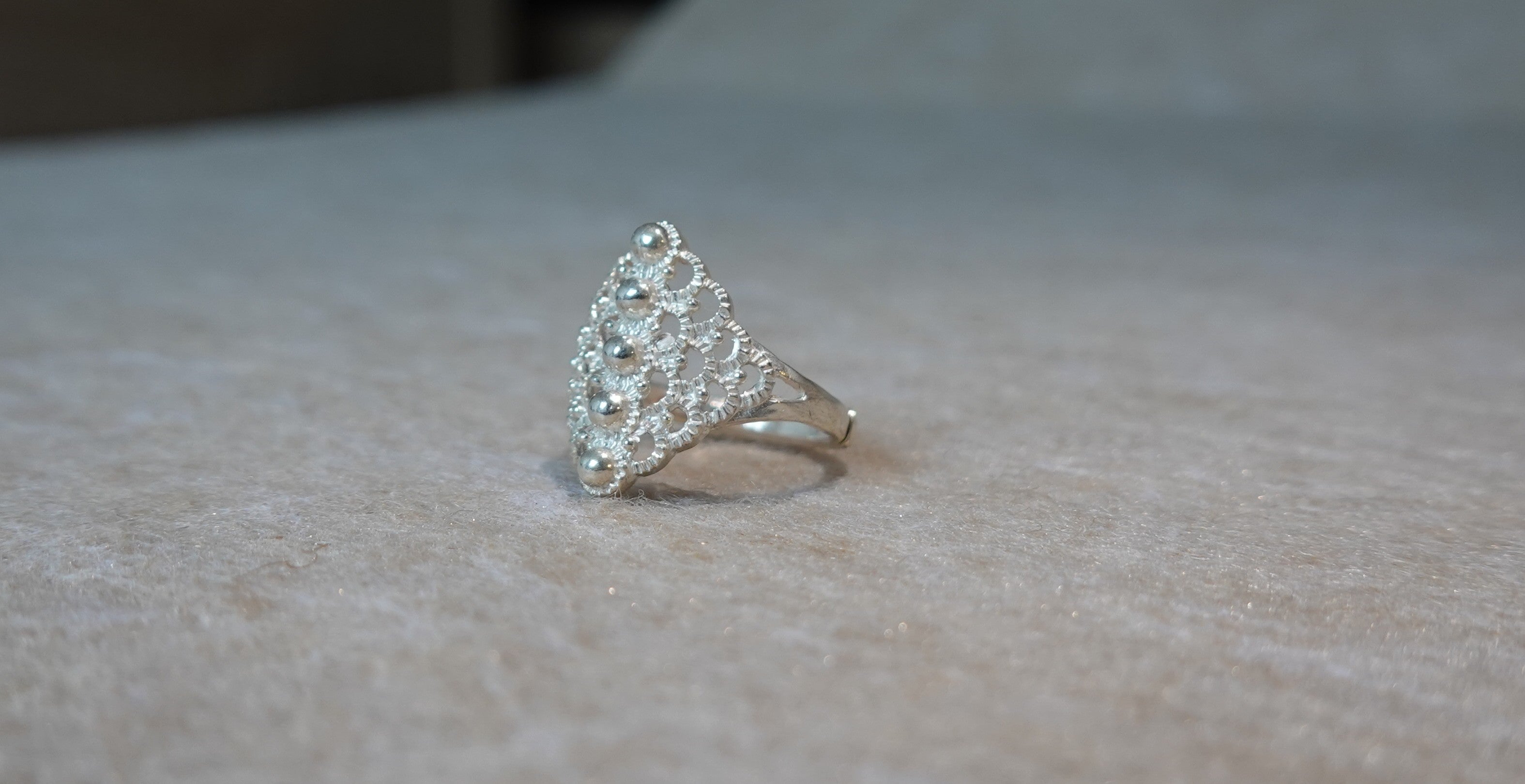 Handmade S999 silver Mountain Spring ring showing sculptural silver details