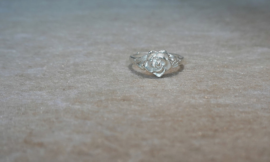 Handmade S999 silver Silver Rose Bloom ring showing sculptural silver details