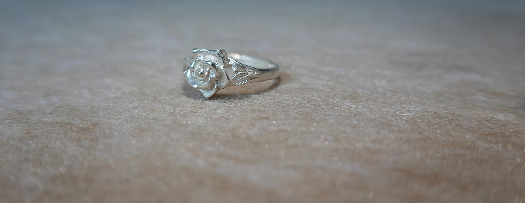 Handmade S999 silver Silver Rose Bloom ring showing sculptural silver details