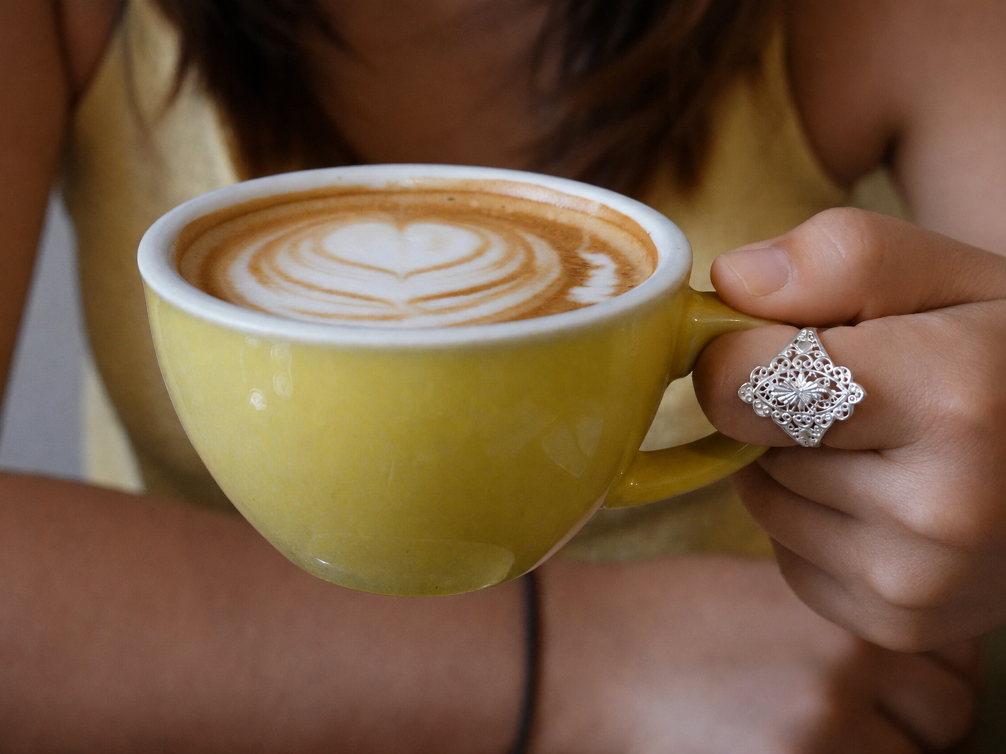 LIOMON Sunlit Leaf silver ring worn in natural everyday styling