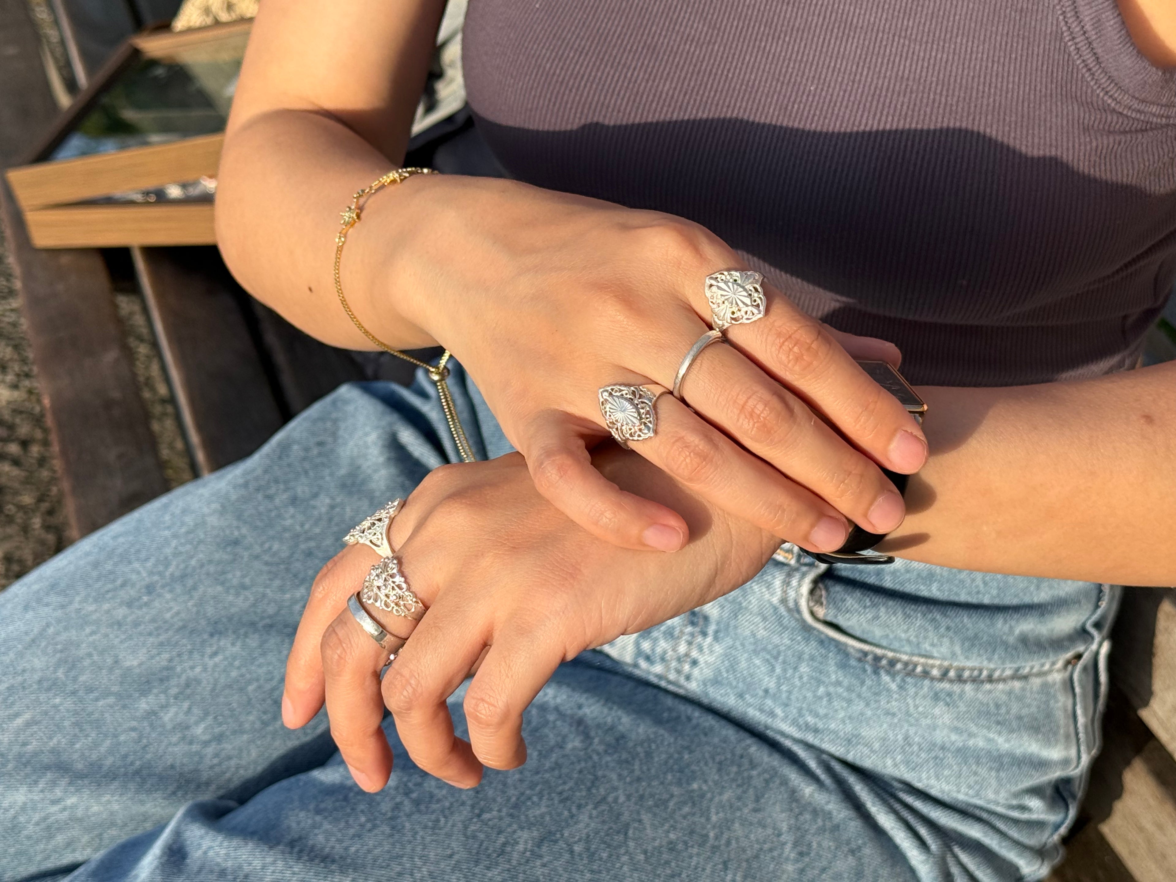 Handmade S999 silver Sunlit Leaf ring showing sculptural silver details